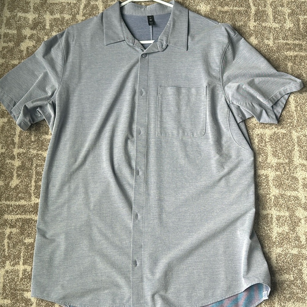 Nearly new lululemon button down shirt worn once.
